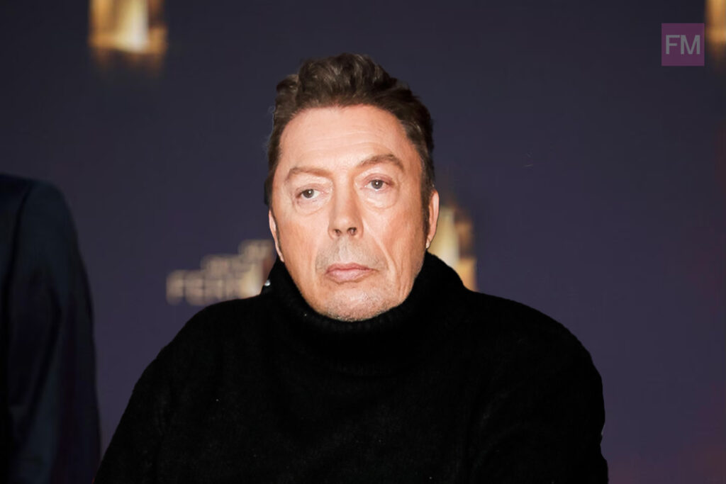 is tim curry gay