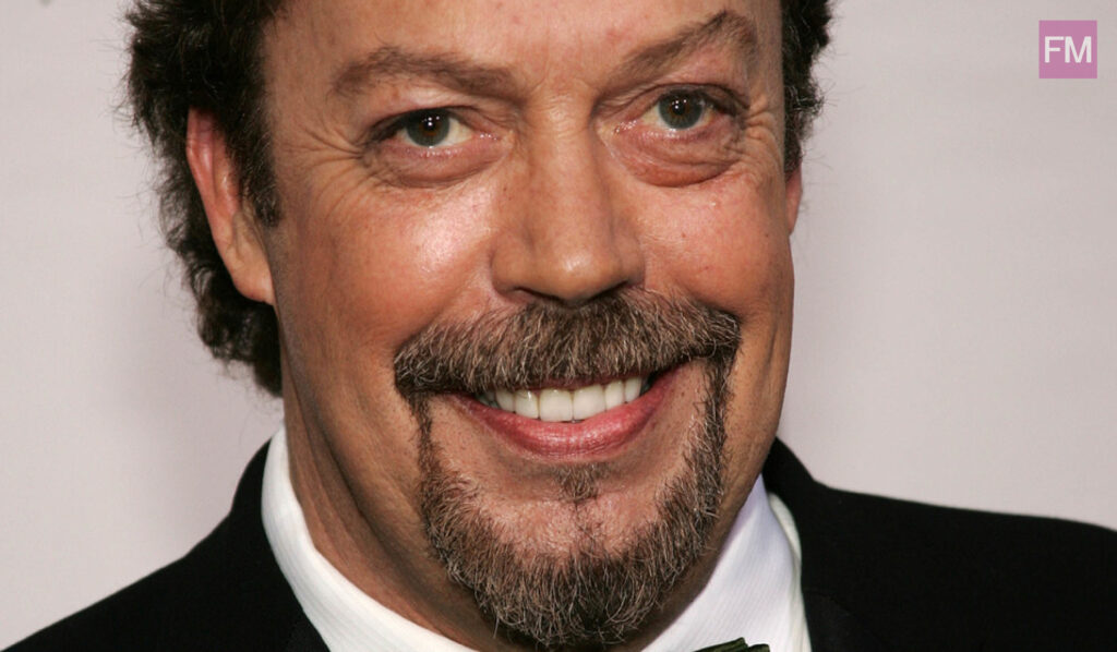 is tim curry gay